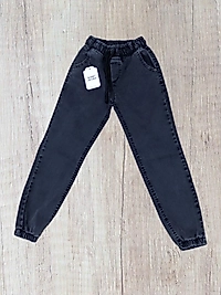 bel ve paça lastikli likralı kot pantolon